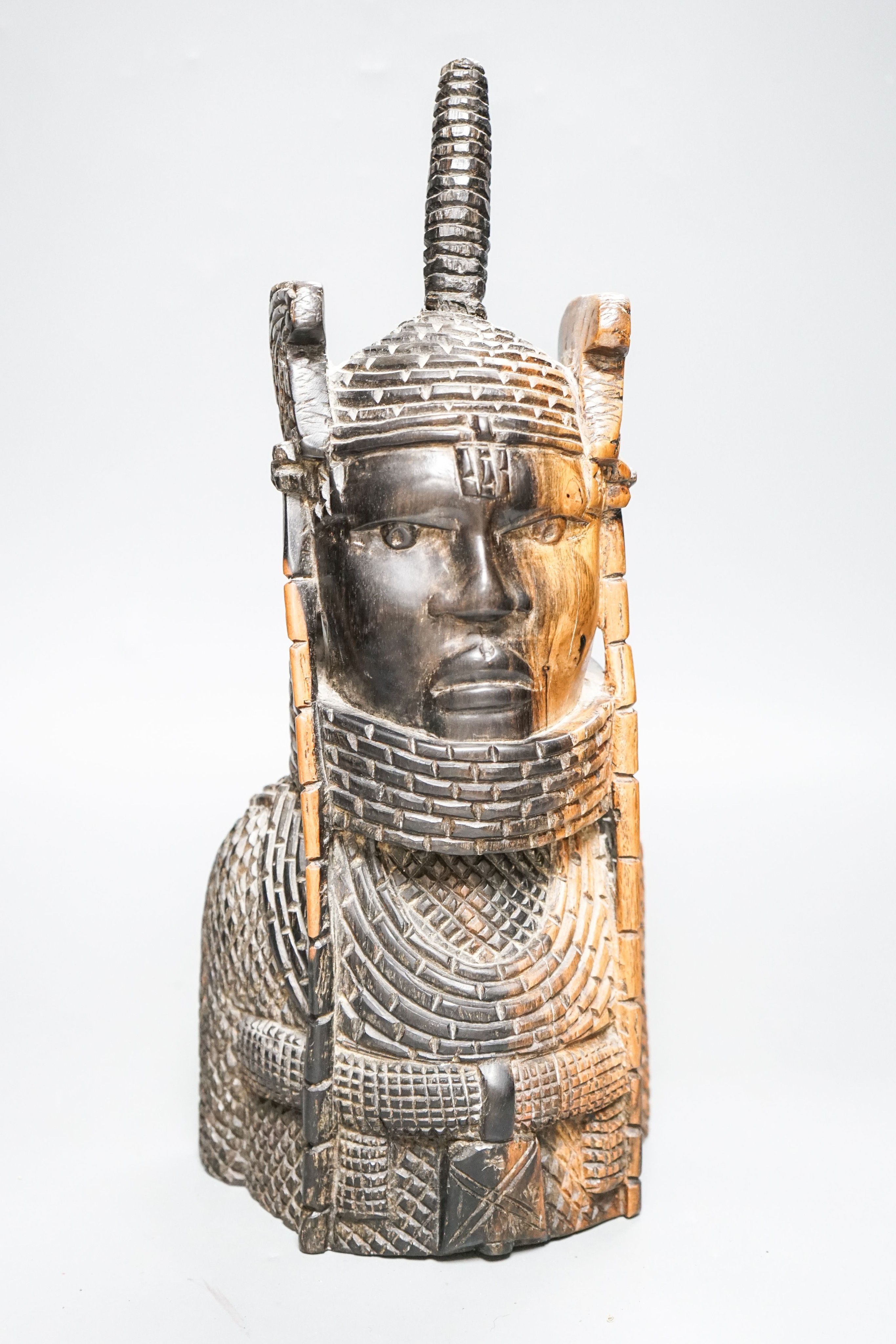 A Nigerian carved hardwood figure of KIng OBA 39cm